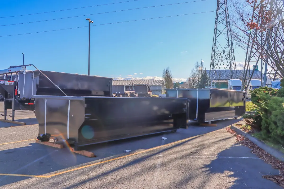 Roll-off dumpster ready for waste disposal at job site for Concrete Dumpster Rental in Pelham